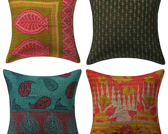 May include: Set of four square throw pillows with different colorful patterns. The pillows are made of kantha fabric, a traditional Indian hand-stitched fabric. The patterns include paisley, floral, and geometric designs.
