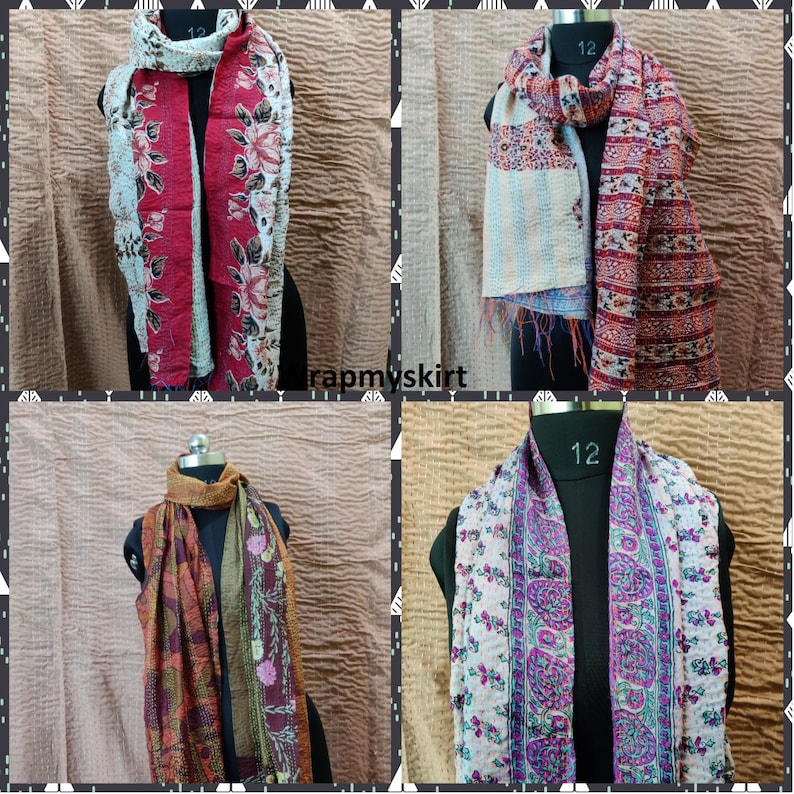 May include: Four different colorful silk scarves with floral patterns. The scarves are displayed on mannequins with the number 12 on the tag.