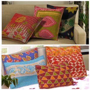 May include: A set of six colorful patterned throw pillows with various designs, including floral, geometric, and paisley patterns. The pillows are made of kantha fabric, a traditional Indian textile known for its intricate stitching and patchwork designs.