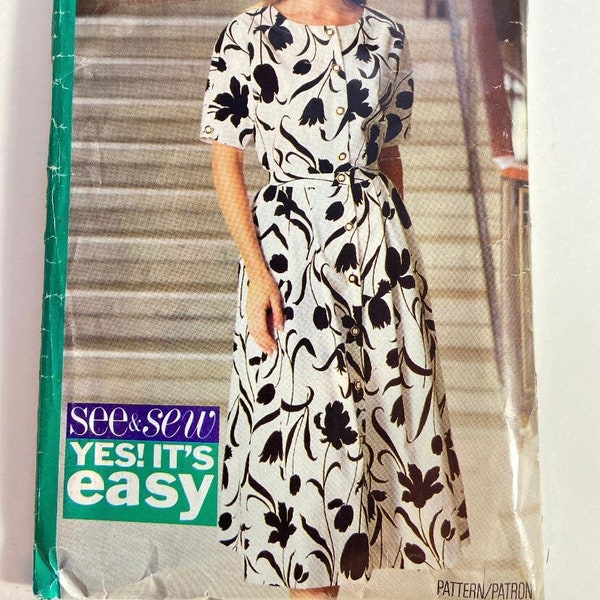 1990s does 50s day dress sewing pattern button down fit and flare full skirt and top set. Butterick pattern 6250