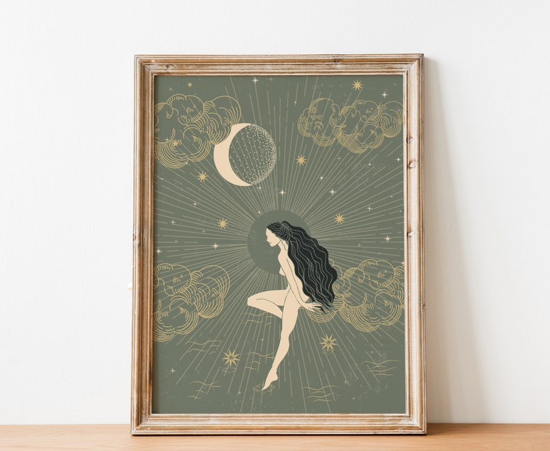 May include: A framed print with a green background and gold accents. The print features a woman with long black hair sitting on a cloud with a crescent moon and stars in the background.