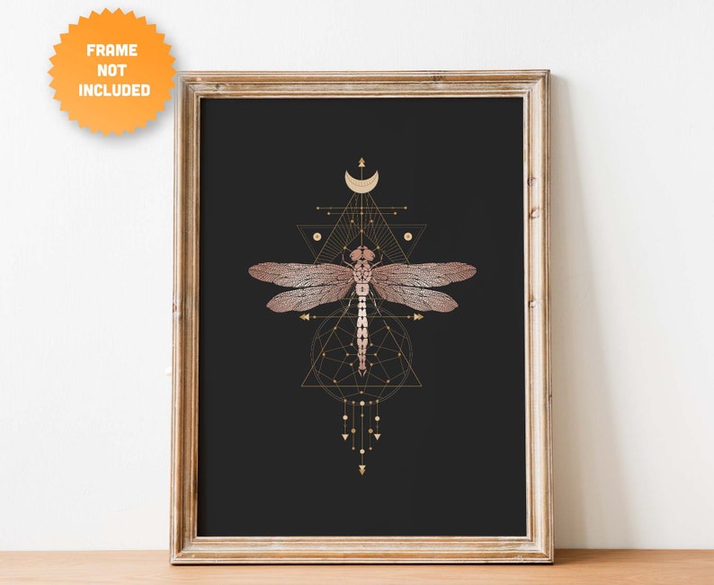 May include: A digital art print featuring a geometric design with a dragonfly in the center. The dragonfly is pink and gold, and the geometric design is gold on a black background.