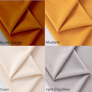 May include: Four fabric swatches in different colors: burnt orange, mustard, cream, and light grey/silver. The swatches are folded in half and arranged in a grid.