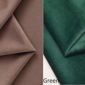 May include: Two fabric swatches, one in a light brown color labeled "Mink" and the other in a dark green color labeled "Green".