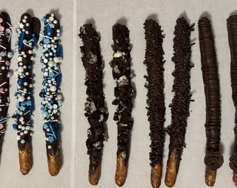 Chocolate pretzels, coconut, pink sprinkle, blue sprinkle, Oreo, choc sprinkle, solid choc with rose, almond. Dark, Milk, White. min12, mix