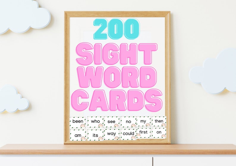 May include: A framed poster with the text "200 Sight Word Cards" in pink and blue letters. The poster shows a sample of the cards with words like "been", "who", "see", "no", "my", "then", "am", "its", "way", "could", "first", and "on".