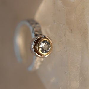 "Volcanic III" ear cuff, unique piece in pure silver, gold, palladium and a beautiful aquamarine.