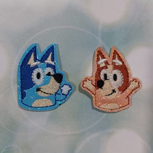 Dog Feltie embroidered on silver vinyl perfect for hair bows, embellishment, badge reels, planner clips, sew on patches and more