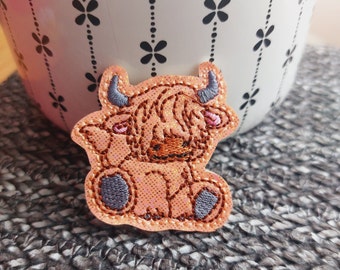 Highland Cow  Feltie  embroidered on vinyl perfect for badge reels, planner clips, decor for hats, bags, jackets, shoes, and more