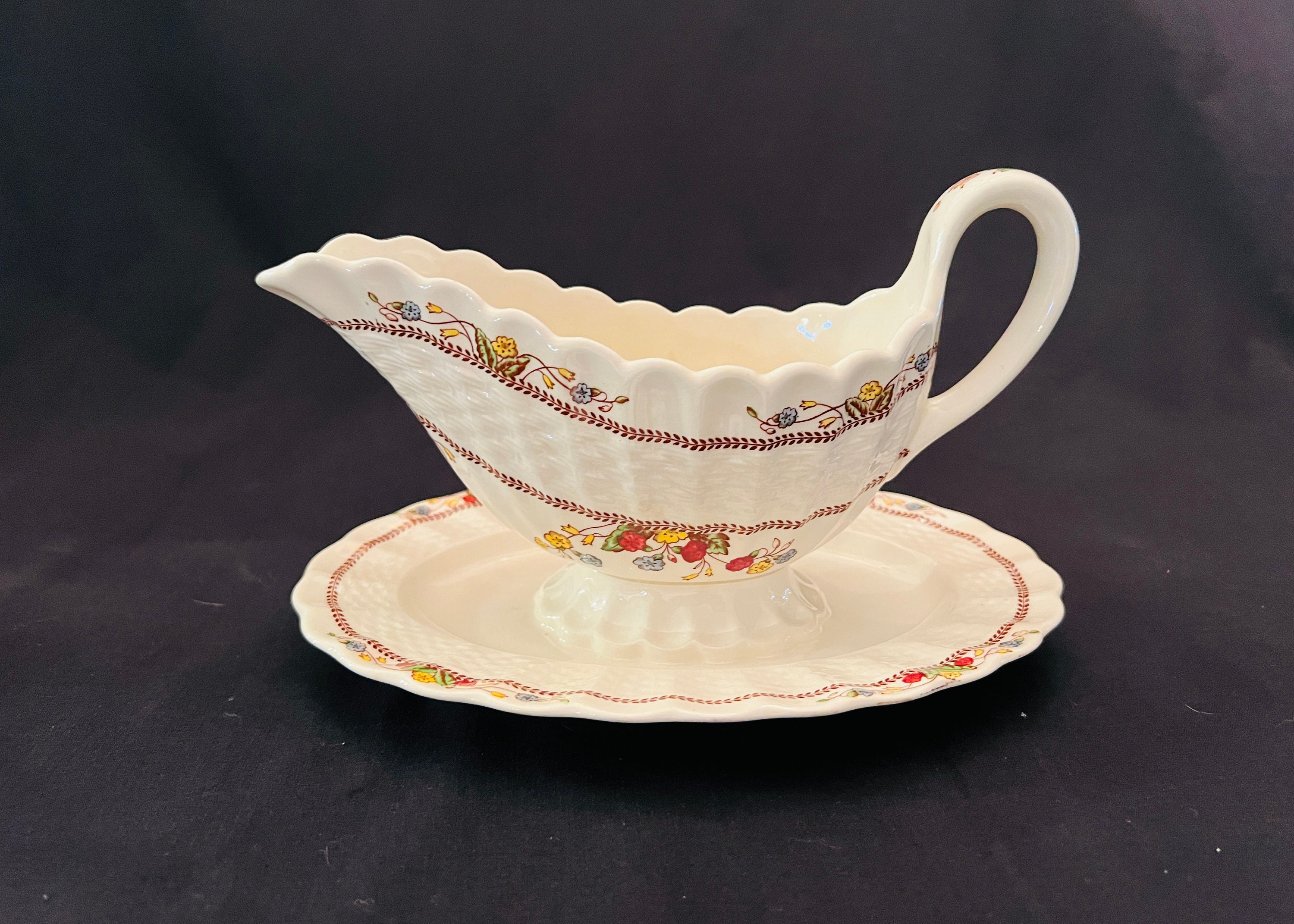 Handmade stoneware gravy boat with plate in Hobbit/ Tenmoku glaze by Bowen  Pottery