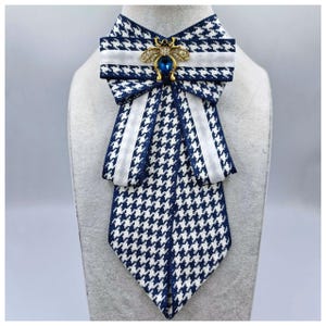 Women tie. Color blue and white. Made from natural ribbon.  Handmade.