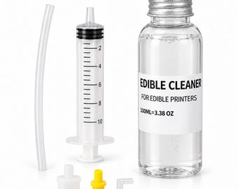 Könnte beinhalten: Eine durchsichtige Kunststoffflasche mit essbarem Reiniger für essbare Drucker, beschriftet mit 100ml=3.38 oz, dazu eine graduierte Spritze, ein flexibler durchsichtiger Schlauch und drei kleine Kunststoffaufsätze in Weiß und Gelb.