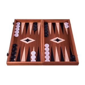 May include: A wooden backgammon game set with black and white playing pieces. The board is open and ready to play.