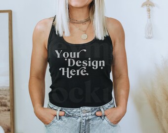 May include: A black tank top with the text "Your Design Here" printed on the front. The tank top is being worn by a person with blonde hair and is paired with light blue denim shorts.