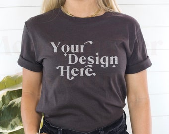 May include: A dark grey t-shirt with the text "Your Design Here" in a white vintage font.