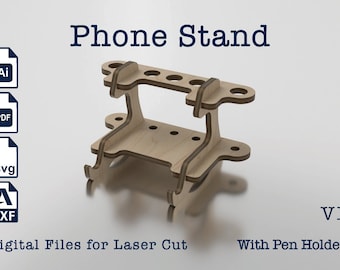 May include: A laser cut phone stand made of wood with a pen holder. The stand is designed to hold a phone upright and has a slot for a pen. The stand is available in digital files for laser cutting in AI, PDF, SVG, and DXF formats.
