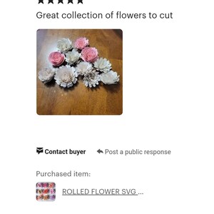 May include: A collection of paper flowers in shades of pink and white. The flowers are layered and have a delicate, handmade appearance.