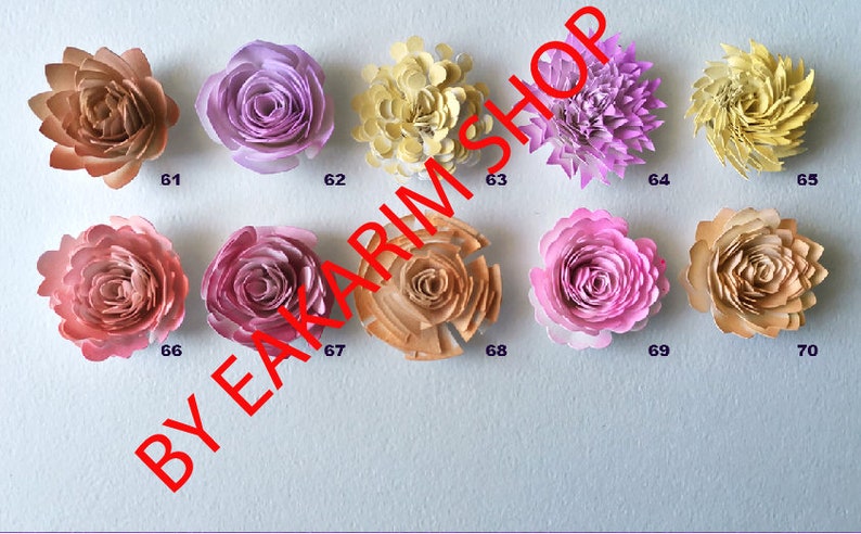 May include: Ten paper flowers in various colors and styles, including peach, pink, and yellow. The flowers are arranged in two rows of five. Each flower is numbered 61 through 70.