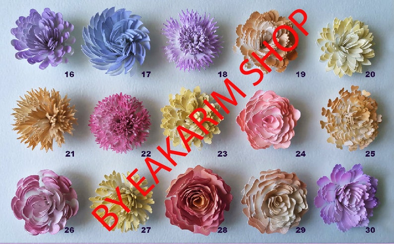 May include: Thirty paper flowers in various colors and styles, including roses, carnations, and other floral designs. The flowers are arranged in rows on a light blue background.