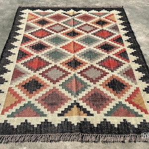 Handwoven Kilim Area Rug in durable jute and wool blend with all-over diamond geometry — a Jute Wool Rug for living rooms, bedrooms, and dining spaces.