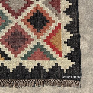 Kilim Area Rug in handwoven jute and wool with bold multicolor diamond lattice pattern — a Jute Wool Rug for boho, farmhouse, and Southwestern interiors.