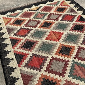 Multicolor Jute Wool Rug in handwoven kilim construction — a bold Kilim Area Rug with stepped-diamond pattern, all sizes woven to order.