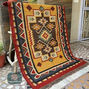 Handmade using a blend of Wool and Jute, this rug boasts durability and eco-friendly charm. The flatweave construction ensures a low profile, making it perfect for high-traffic areas while retaining its elegance and sophistication.
