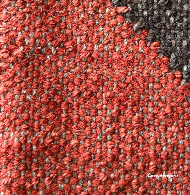 Traditional Indian kilim rug made with sustainable jute and wool, handwoven in bold red with intricate geometric patterns. Designed to elevate boho, farmhouse, or heritage-inspired homes, this lightweight flatweave piece adds timeless charm to spaces like dining rooms, bedside areas, or entryways.