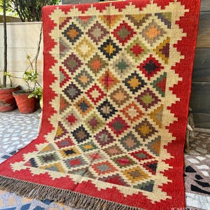 Perfect for bohemian, rustic, or Southwestern interiors, this handmade Moroccan rug blends traditional craftsmanship with modern versatility. Elevate your home decor with this unique, artisan-made rug that adds warmth