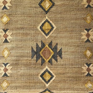 Subtle beige cream jute rug with geometric kilim pattern and dark border for definition, hand‑crafted in natural fiber flatweave. Earthy texture and neutral palette enhance rustic, cottage, or Scandi interiors. Offers a calming foundation — soft tones underfoot, artisanal weave, and versatile enough to match wood or metal accents while maintaining serenity in the space.