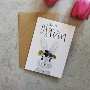 Cartão com coelho e coroa de flores secas - Saudações de Páscoa, Cartão de Páscoa, Feliz Páscoa