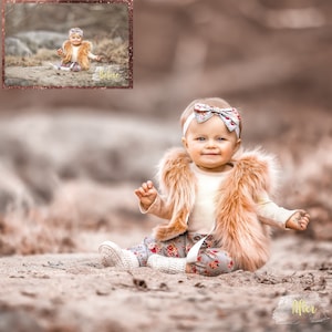 May include: A young girl wearing a brown faux fur vest, a white shirt, and floral trousers sits on the ground. She has a white headband with a floral bow on her head. The background is blurred and has a warm, brown tone.