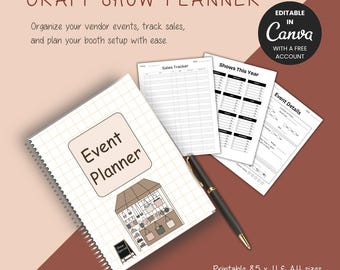 May include: A craft show planner with a spiral binding, featuring a beige cover with the words "Event Planner" and an illustration of a craft booth. Includes pages for sales tracking and event details. A black pen rests on the pages. Text reads "Craft Show Planner".