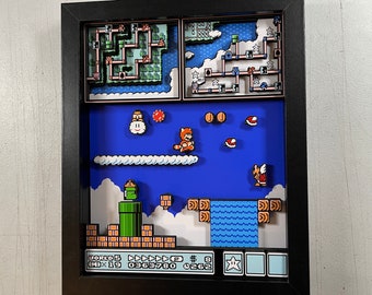 May include: A 3D diorama of a level from the Super Mario Bros. video game. The diorama features a blue sky, white clouds, a green pipe, a waterfall, and a star. The text on the screen reads "WORLD 5" and "MID 19".
