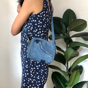 Upcycled jean small crossbody bag. Handmade handbag. Denim crossbody bag.