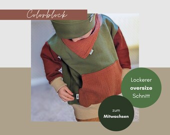 Organic cotton and color block design: the perfect sweater for your child