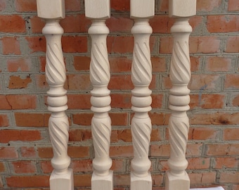 May include: Four wooden balusters with a twisted design and a rounded top. The balusters are light brown and have a smooth finish.