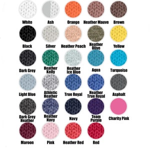 May include: Color chart with 24 different colors of fabric swatches. The colors include white, ash, orange, heather mauve, brown, black, silver, heather peach, heather olive, yellow, dark grey, heather kelly, heather ice blue, aqua, turquoise, light blue, athletic heather, true royal, heather true royal, asphalt, dark grey heather, heather navy, navy, team purple, charity pink, maroon, pink, heather red, and red.
