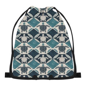 May include: A drawstring backpack featuring a repeating pattern of sea turtles in shades of blue and cream. The turtles are set against a geometric background of diamonds and leaf-like shapes. The bag has black drawstrings and trim.