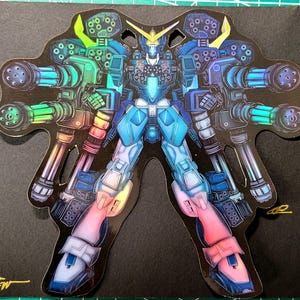 May include: A detailed illustration of a blue and white robot with multiple arms and cannons. The robot is depicted in a dynamic pose, with its arms extended and cannons pointed forward. The illustration is done in a vibrant, colorful style, with a holographic effect.