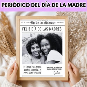 May include: A framed newspaper print with the headline "PERI&Oacute;DICO DEL D&Iacute;A DE LA MADRE" and "FELIZ D&Iacute;A DE LAS MADRES!" in Spanish. The image features a black and white photo of two smiling women. Text includes "El hogar est&aacute; donde est&aacute; el coraz&oacute;n... y mam&aacute; es mi coraz&oacute;n."