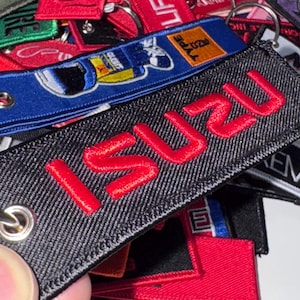Personalized Embroidered Keychain, Custom Remove before flight key chain - Unique Handmade Gift for Any Occasion