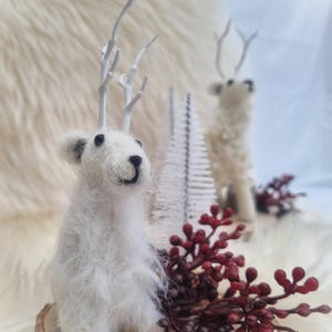 Winter Christmas decoration, Christmas gift. Felted deer on a wooden disc decorated with branches.