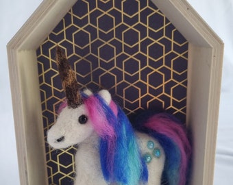 Wool felted unicorn in an open frame to stand or hang. Sweet gift and decoration for all unicorn fans.