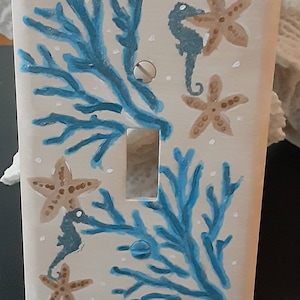 Copertura switchplate con tema Seahorse e Beach.