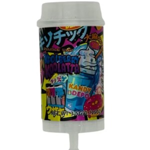May include: A cylindrical candy container with a white lid. The label features Japanese text, a cartoon character, and the words "Blueberry Koolatta" and "Kandy Depo". The net weight is 3.5g (0.125oz).
