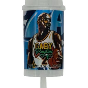 May include: A cylindrical container with a white cap and a clear, tapered bottom. The container features a blue background with an illustration of Gary Payton in a basketball uniform. Text on the container reads "GARY Payton" and "NET WT 3.5G (0.125OZ)".