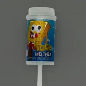 May include: A clear plastic container with a white lid and a white stick. The container has a blue label with a yellow SpongeBob SquarePants graphic and the text "FACE MELTERZ". Net wt 3.5g (0.125oz).