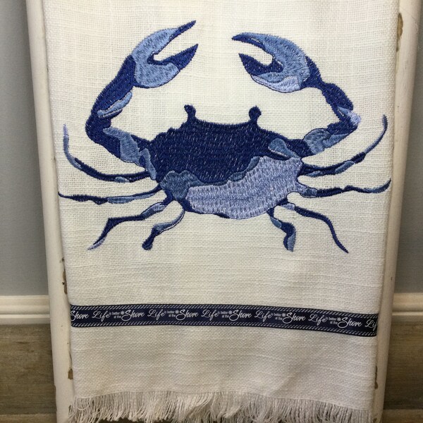 Blue crab embroidered tea towel with fringe and ribbon