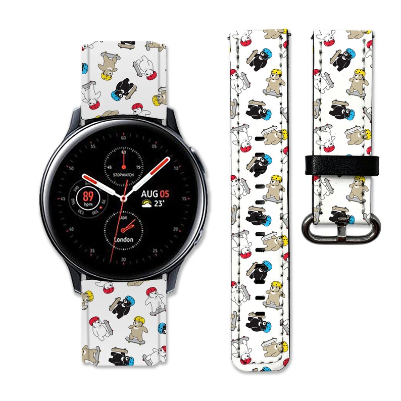 May include: A white smartwatch band with a black and white pattern of bears on skateboards. The band is compatible with Samsung Galaxy Watch 46mm smartwatches. The watch face displays the date, time, and temperature.